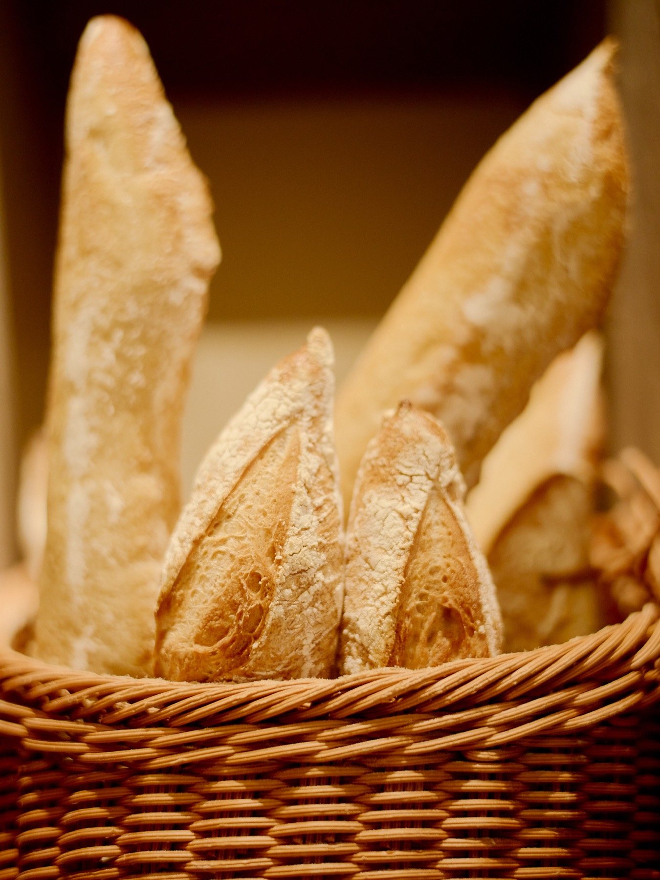 Copain baguettes and country loaves gathered in a market basket